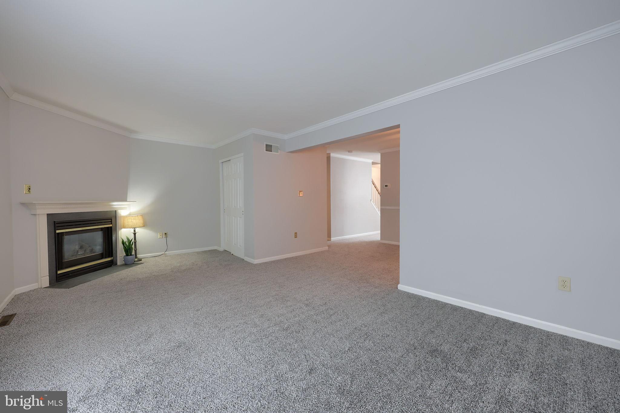 2904 Newport Way Reading, PA 19608 - Photo 16 of 35 Spacious living area with cozy fireplace.