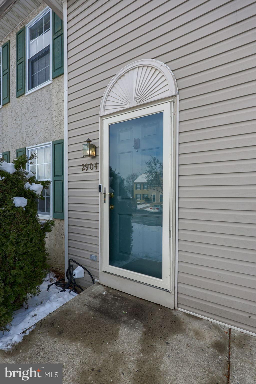 2904 Newport Way Reading, PA 19608 - Photo 3 of 35 Front door with glass storm door.