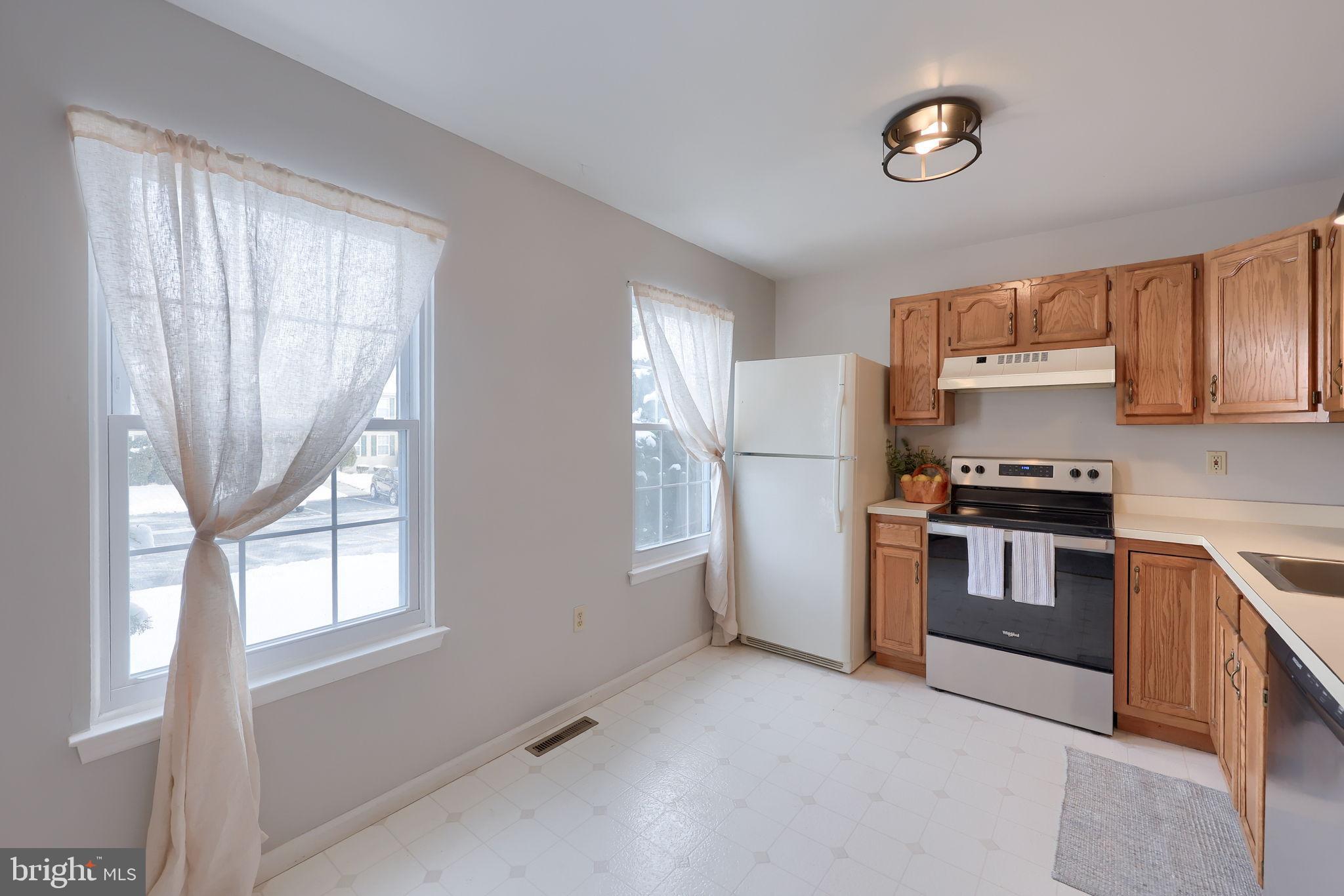 2904 Newport Way Reading, PA 19608 - Photo 6 of 35 Bright and airy kitchen with natural light.
