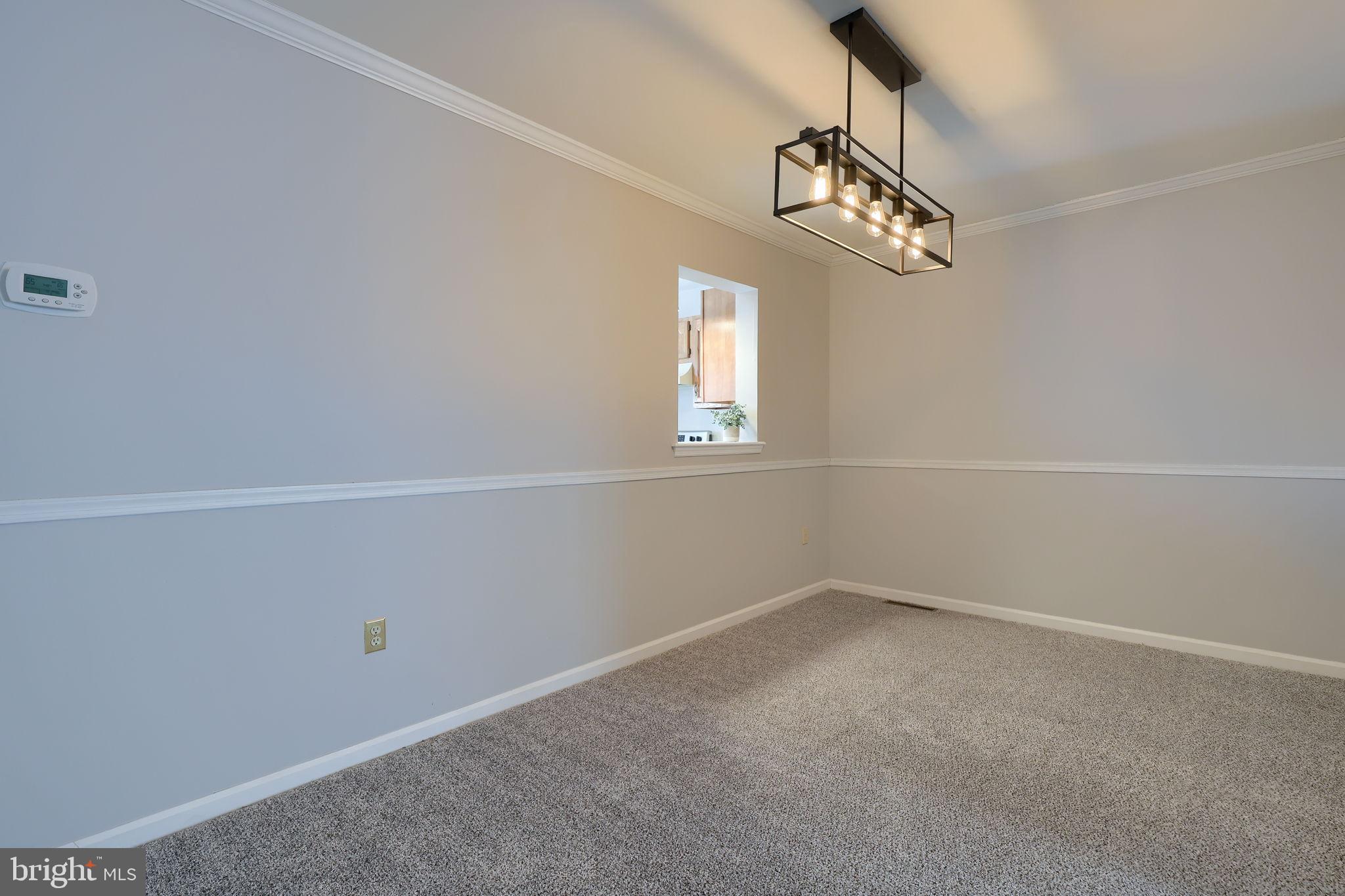 2904 Newport Way Reading, PA 19608 - Photo 10 of 35 Dining space with modern lighting.