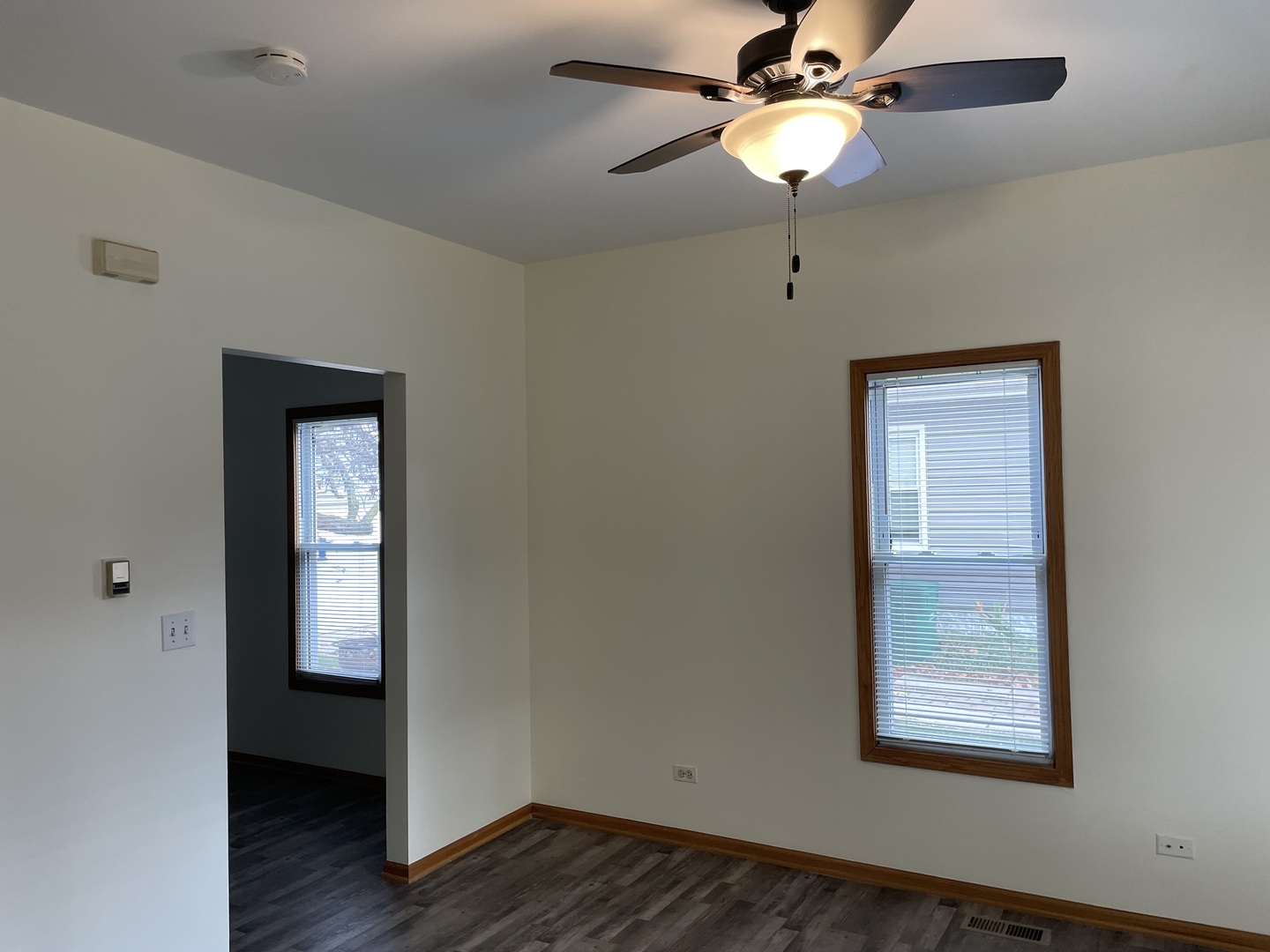 320 East 13th Street, Unit A Lockport, IL 60441 - Photo 14 of 24 a view of room with hardwood floor and fan