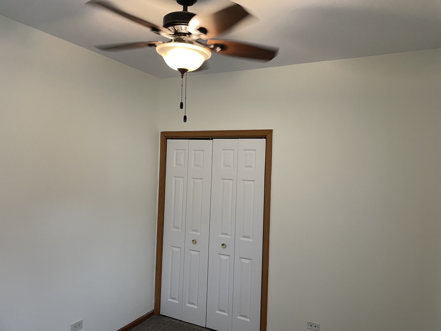 320 East 13th Street, Unit A Lockport, IL 60441 - Photo 20 of 24 a view of a hallway with a chandelier fan
