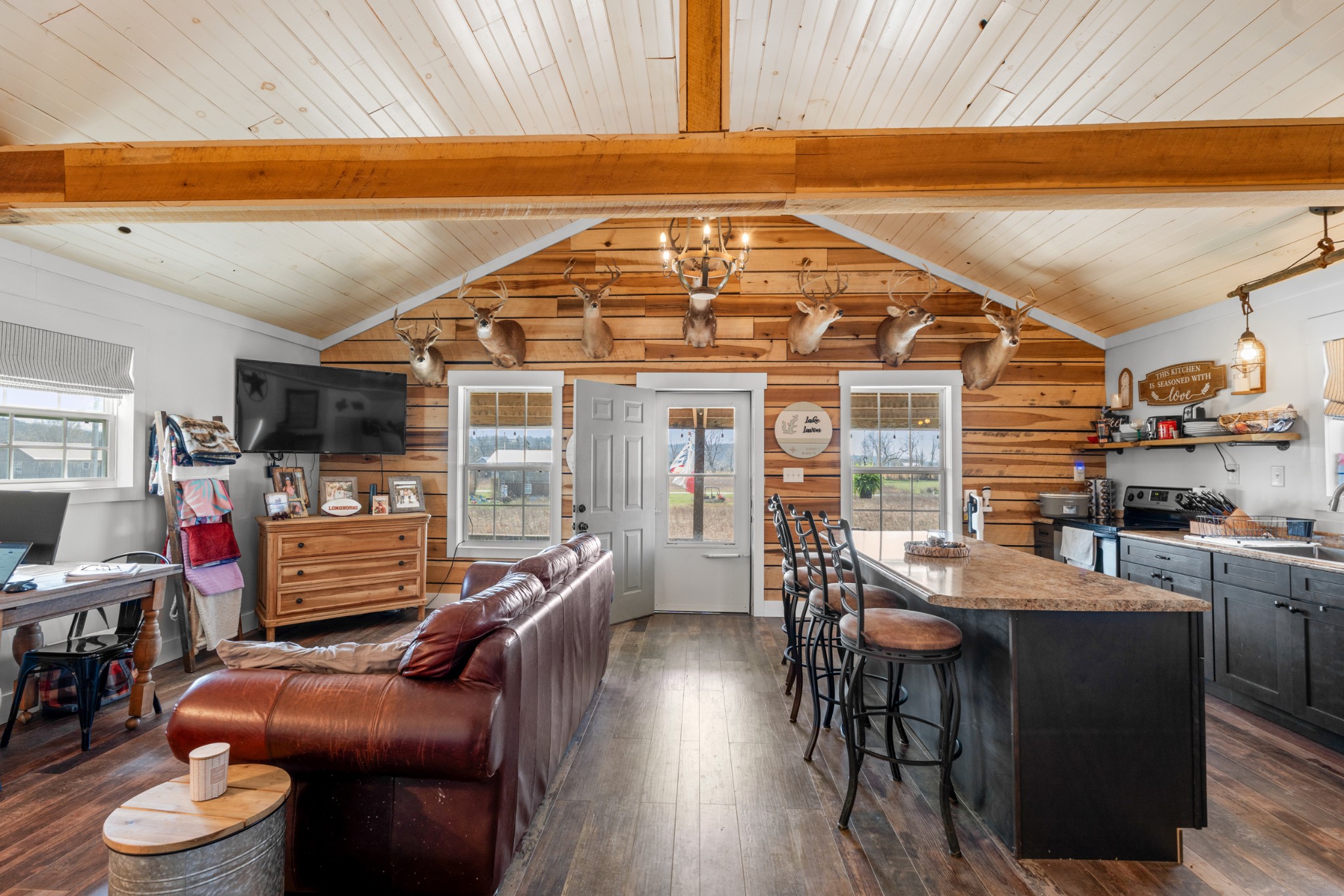 168 Mackin Road Linden, TN 37096 - Photo 15 of 32 a dining room with furniture and a floor to ceiling window
