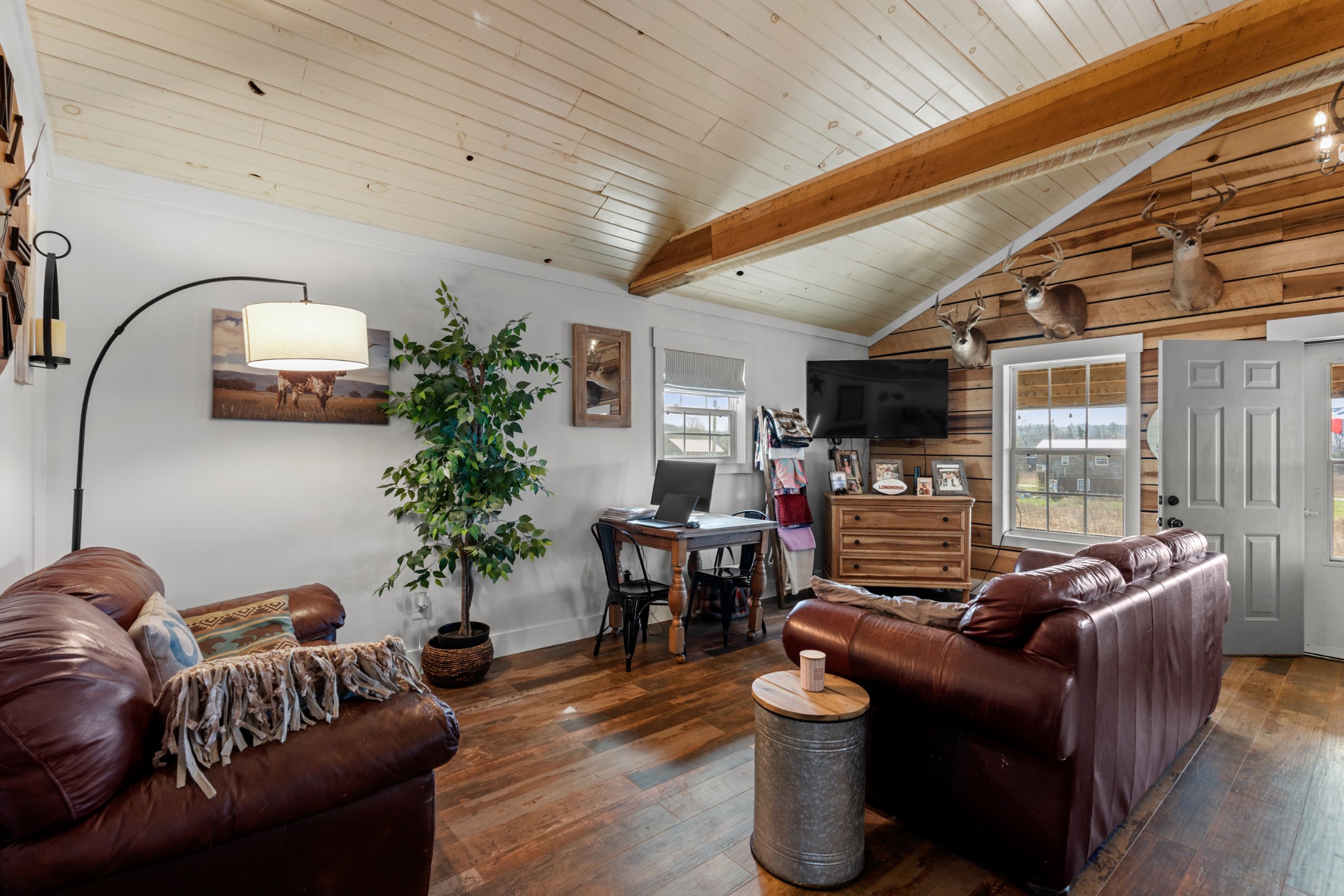 168 Mackin Road Linden, TN 37096 - Photo 17 of 32 a living room with furniture and a large window