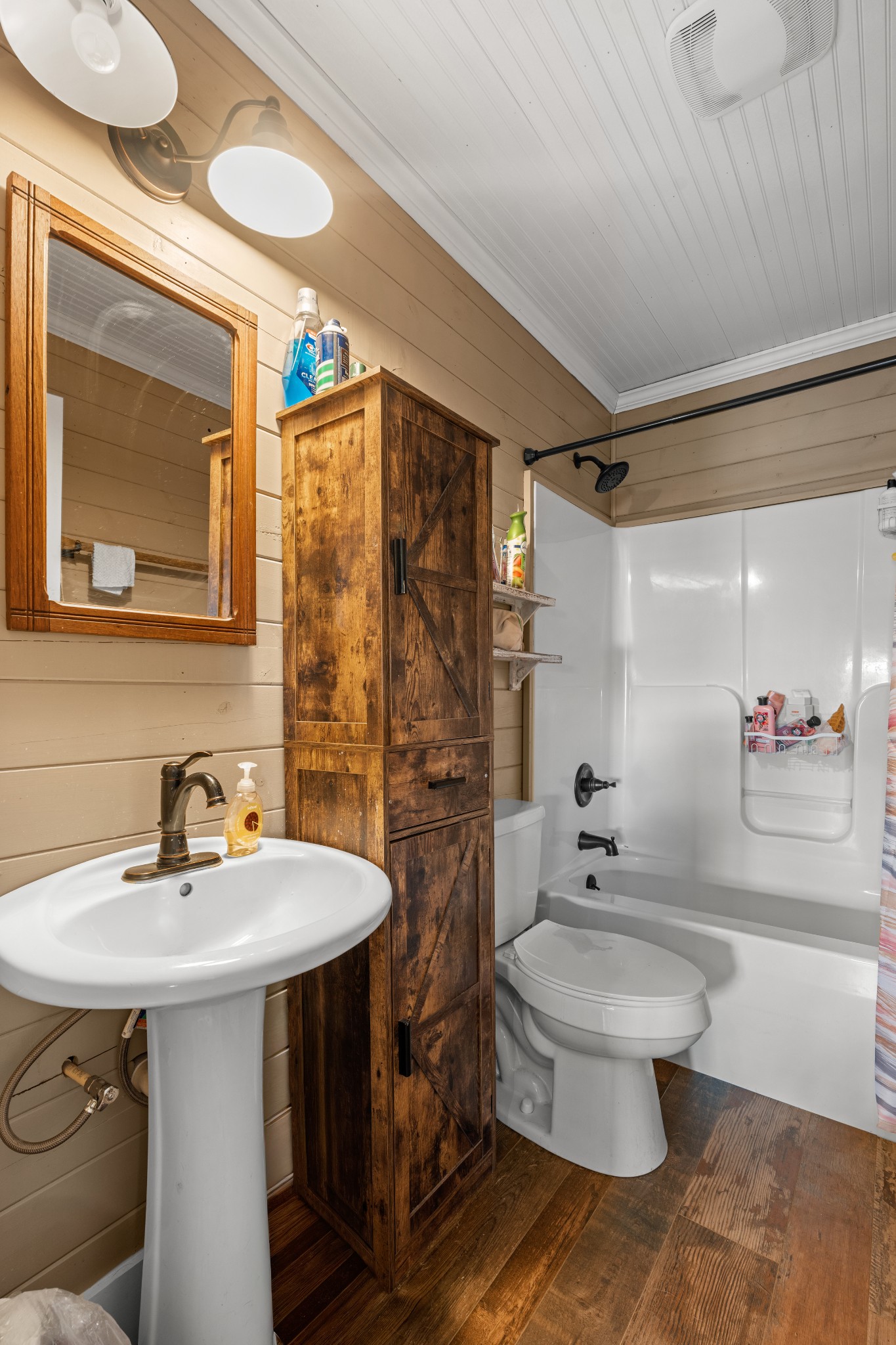 168 Mackin Road Linden, TN 37096 - Photo 26 of 32 a bathroom with a sink toilet and shower