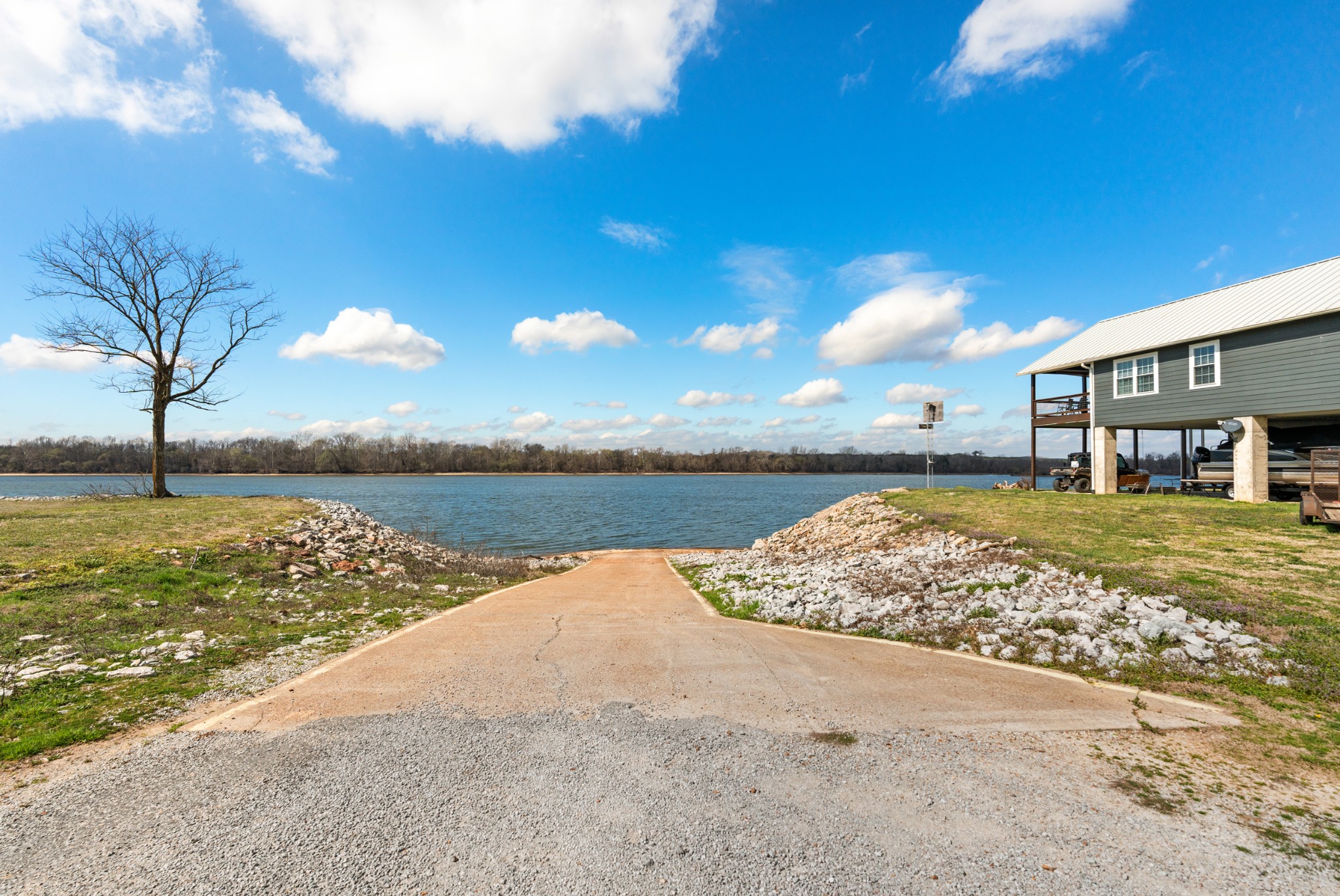168 Mackin Road Linden, TN 37096 - Photo 6 of 32 a view of a house with a yard