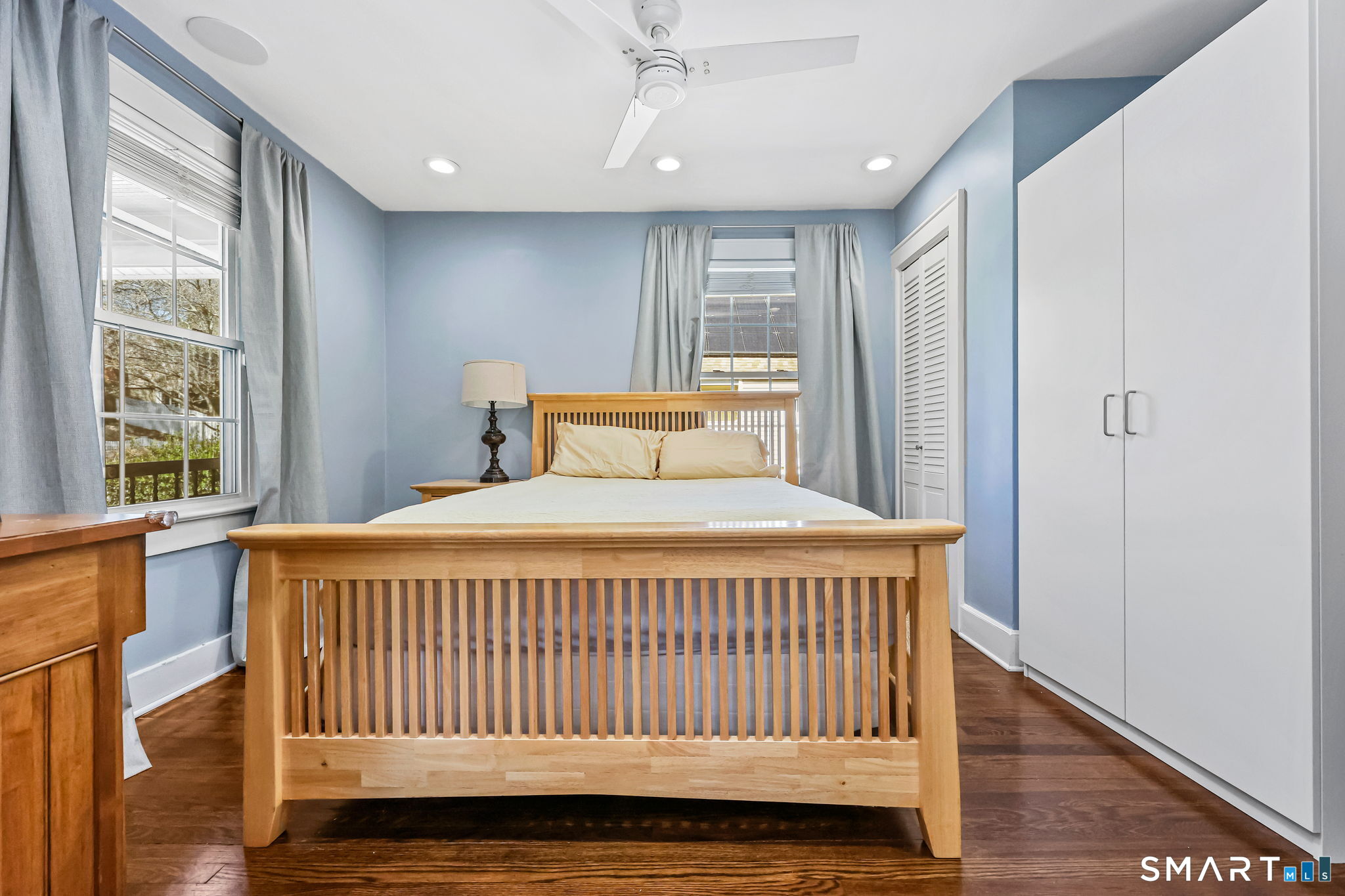 105 Knickerbocker Avenue Stamford, CT 06907 - Photo 15 of 31 a large bed sitting in a bedroom next to a window