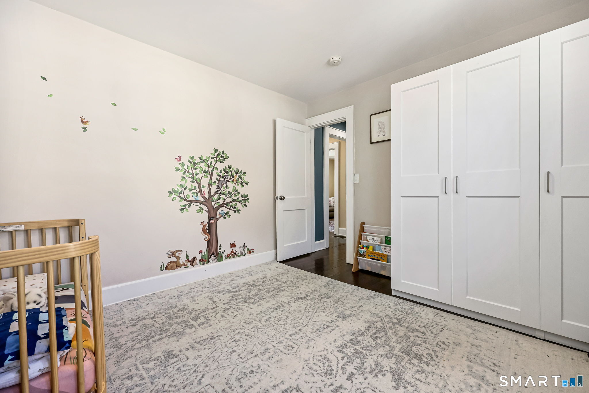105 Knickerbocker Avenue Stamford, CT 06907 - Photo 17 of 31 a bedroom with a bed and a closet
