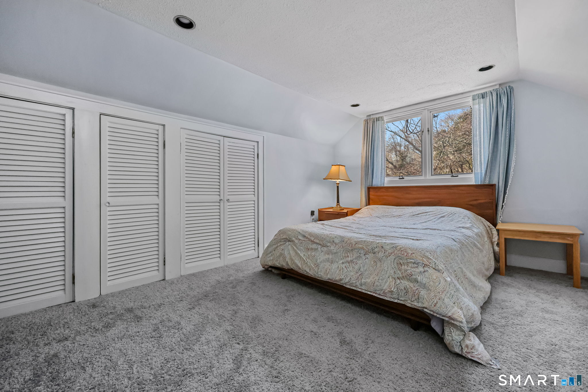 105 Knickerbocker Avenue Stamford, CT 06907 - Photo 21 of 31 a bedroom with a bed and a window