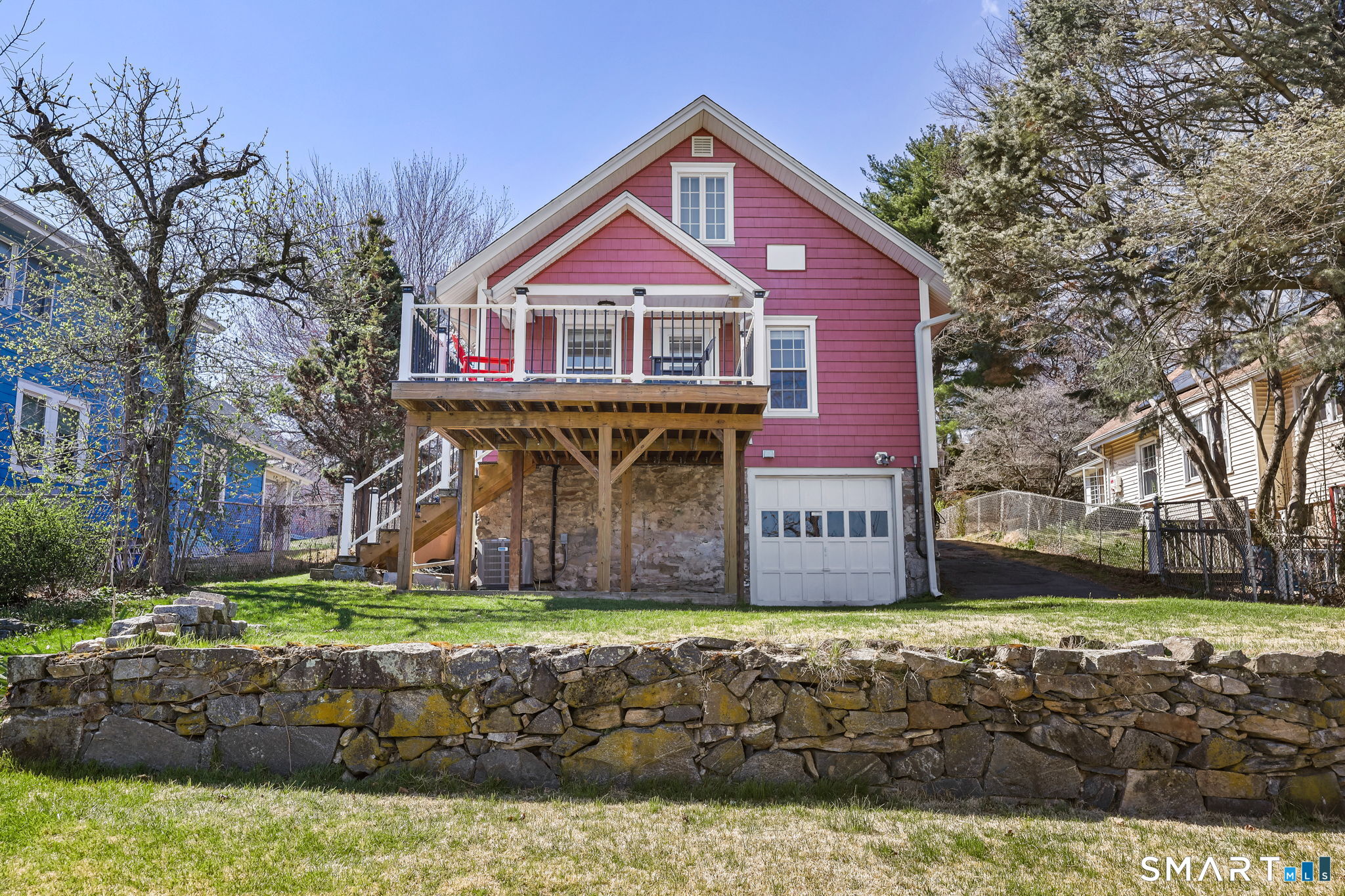 105 Knickerbocker Avenue Stamford, CT 06907 - Photo 23 of 31 a front view of a house with a yard