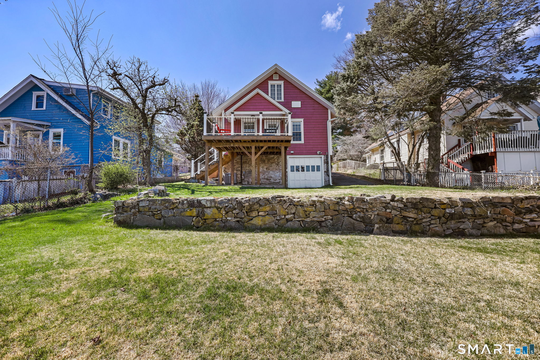 105 Knickerbocker Avenue Stamford, CT 06907 - Photo 24 of 31 a front view of a house with a yard