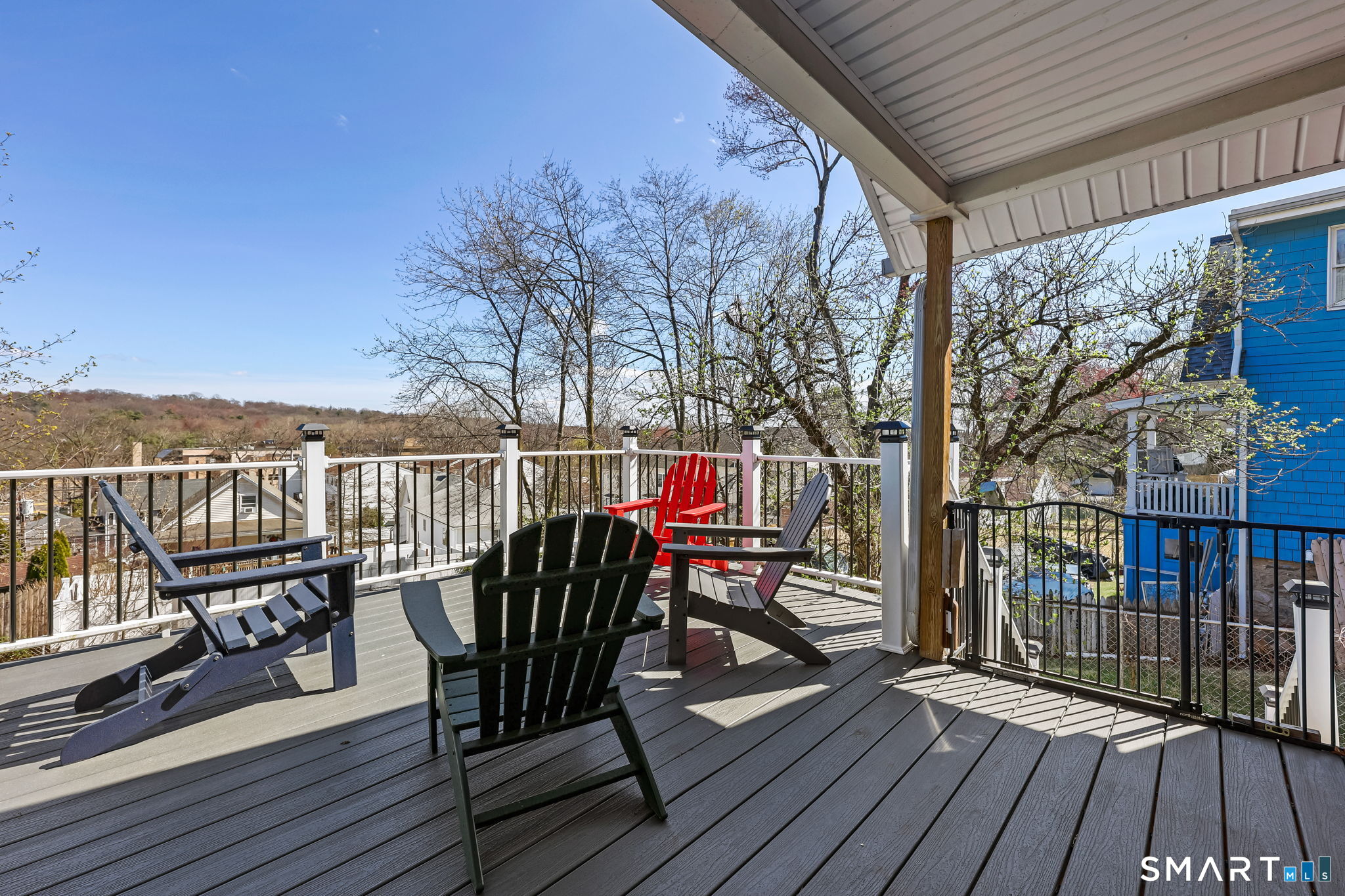 105 Knickerbocker Avenue Stamford, CT 06907 - Photo 28 of 31 a view of a deck with furniture and wooden floor