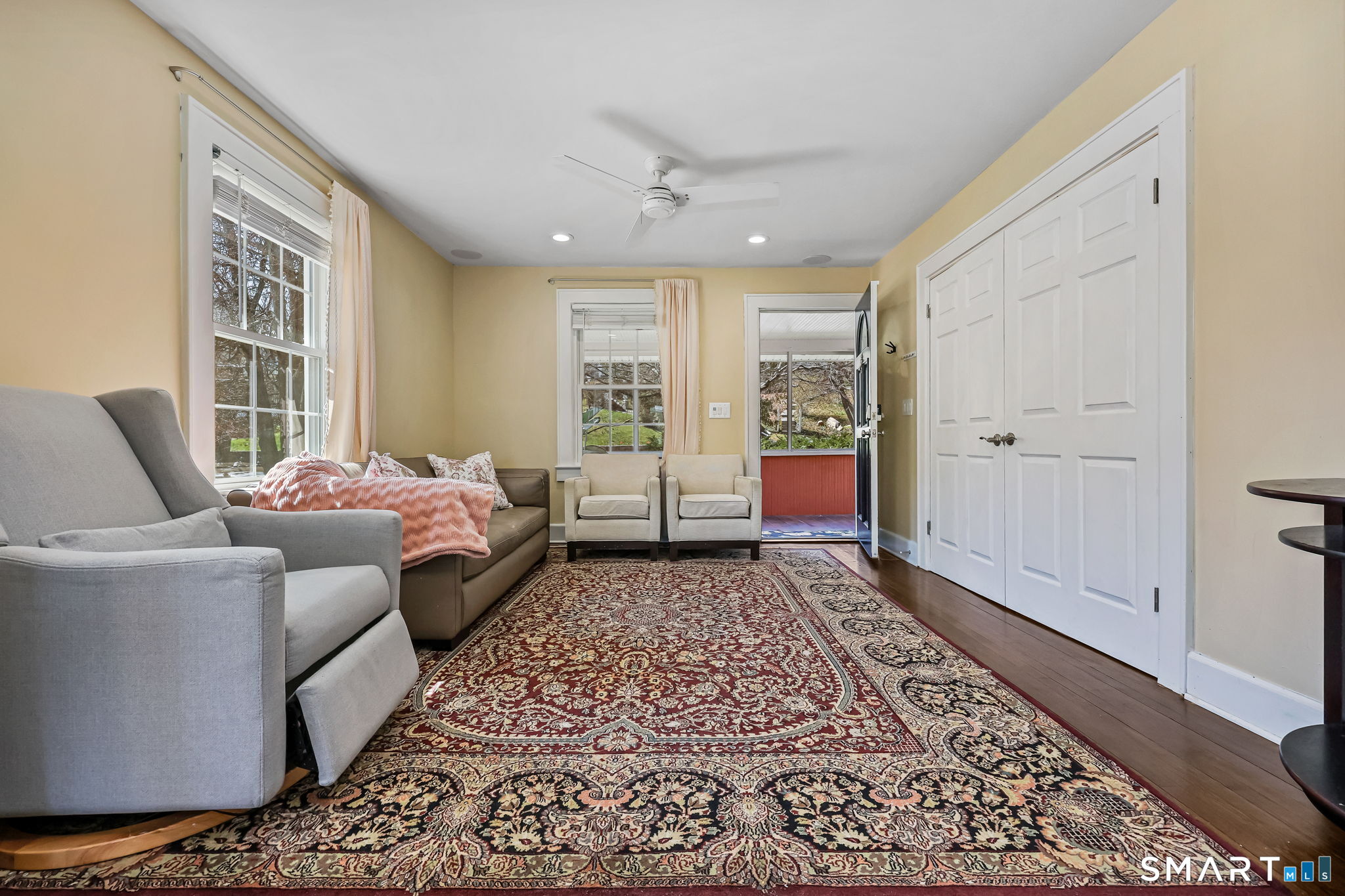 105 Knickerbocker Avenue Stamford, CT 06907 - Photo 7 of 31 a living room with furniture and a rug