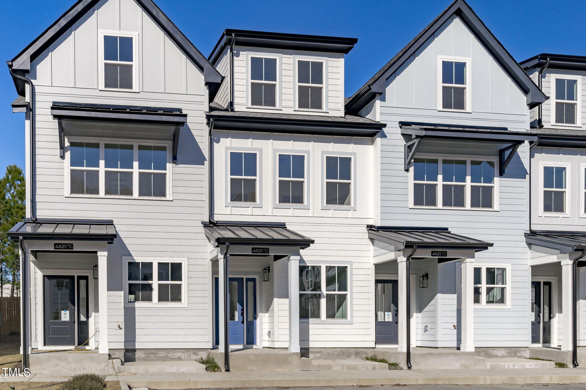 a front view of residential houses