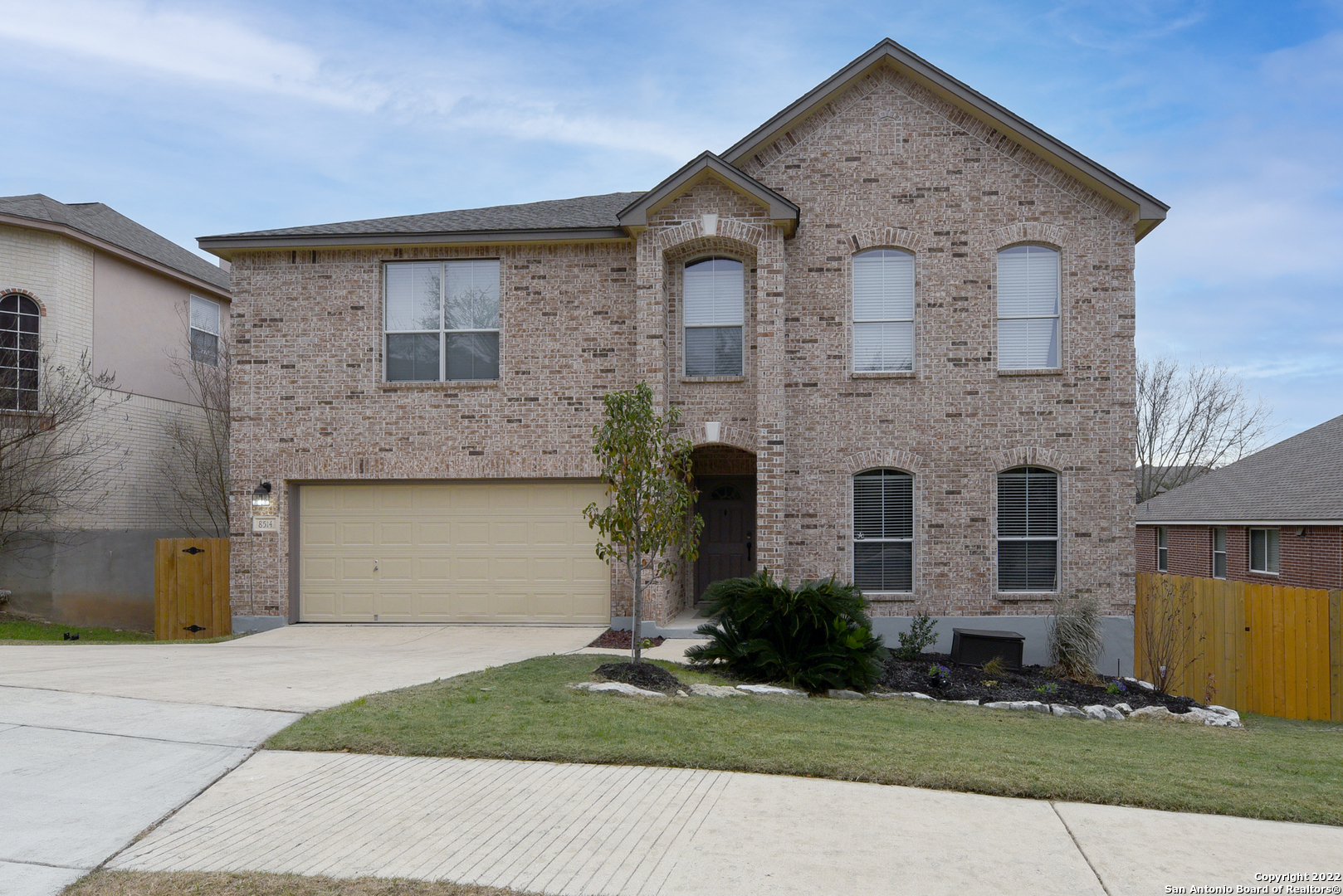 8514 Espanola Drive Helotes, TX 78023 - Photo 1 of 1 a front view of a house with a yard and garage