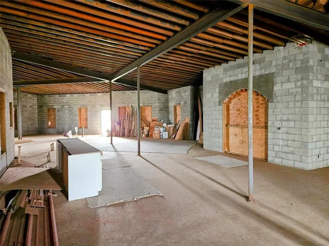 a patio with table and chairs
