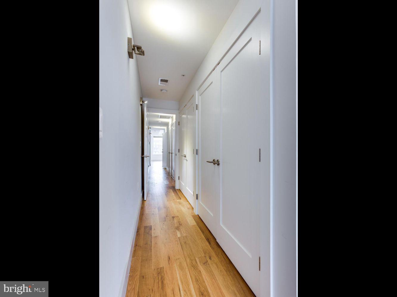 254 15th Street Southeast, Unit 4 Washington, DC 20003 - Photo 15 of 23 a view of a hallway with wooden floor