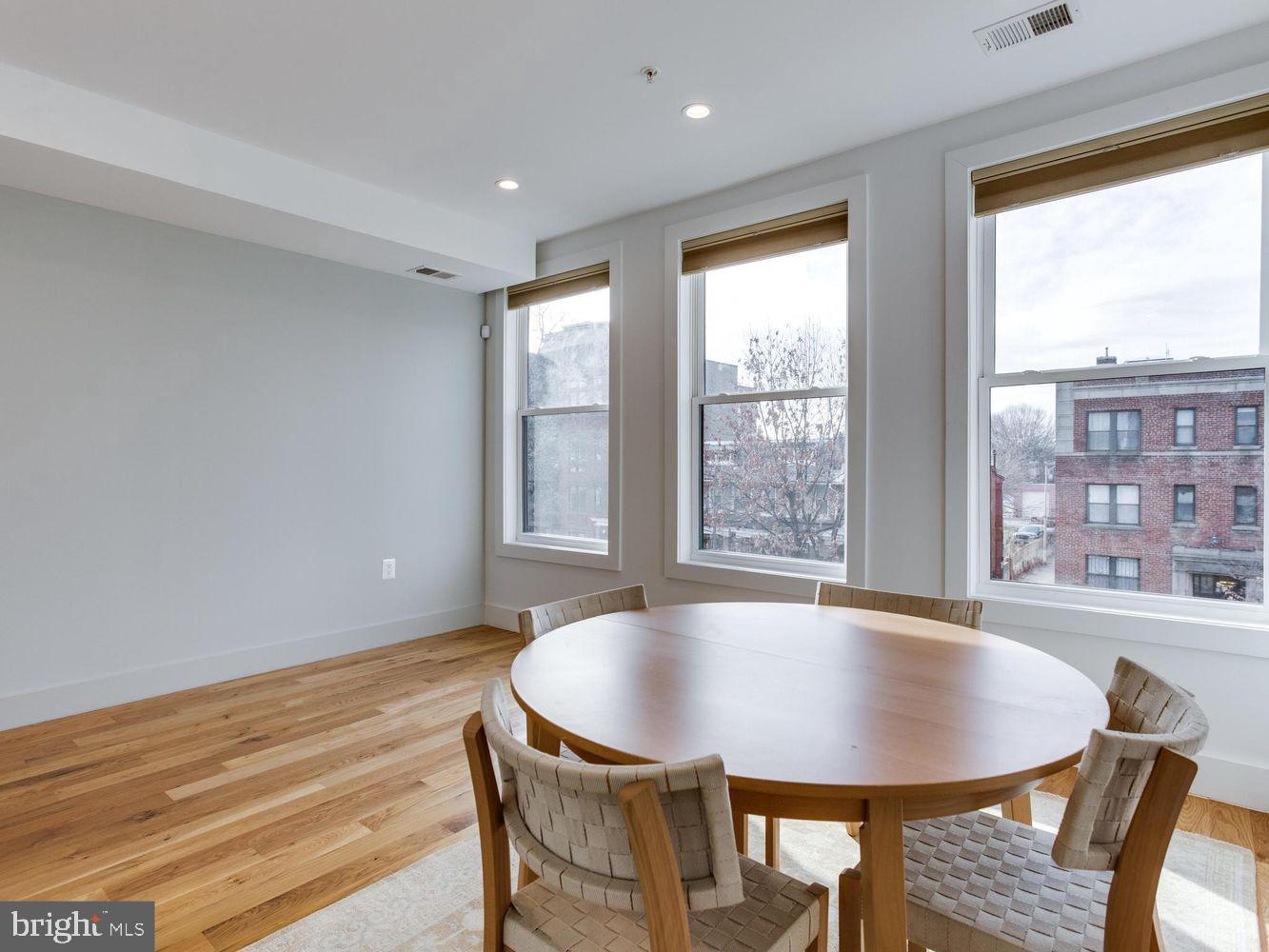 254 15th Street Southeast, Unit 4 Washington, DC 20003 - Photo 10 of 23 a view of a dining room with furniture and window