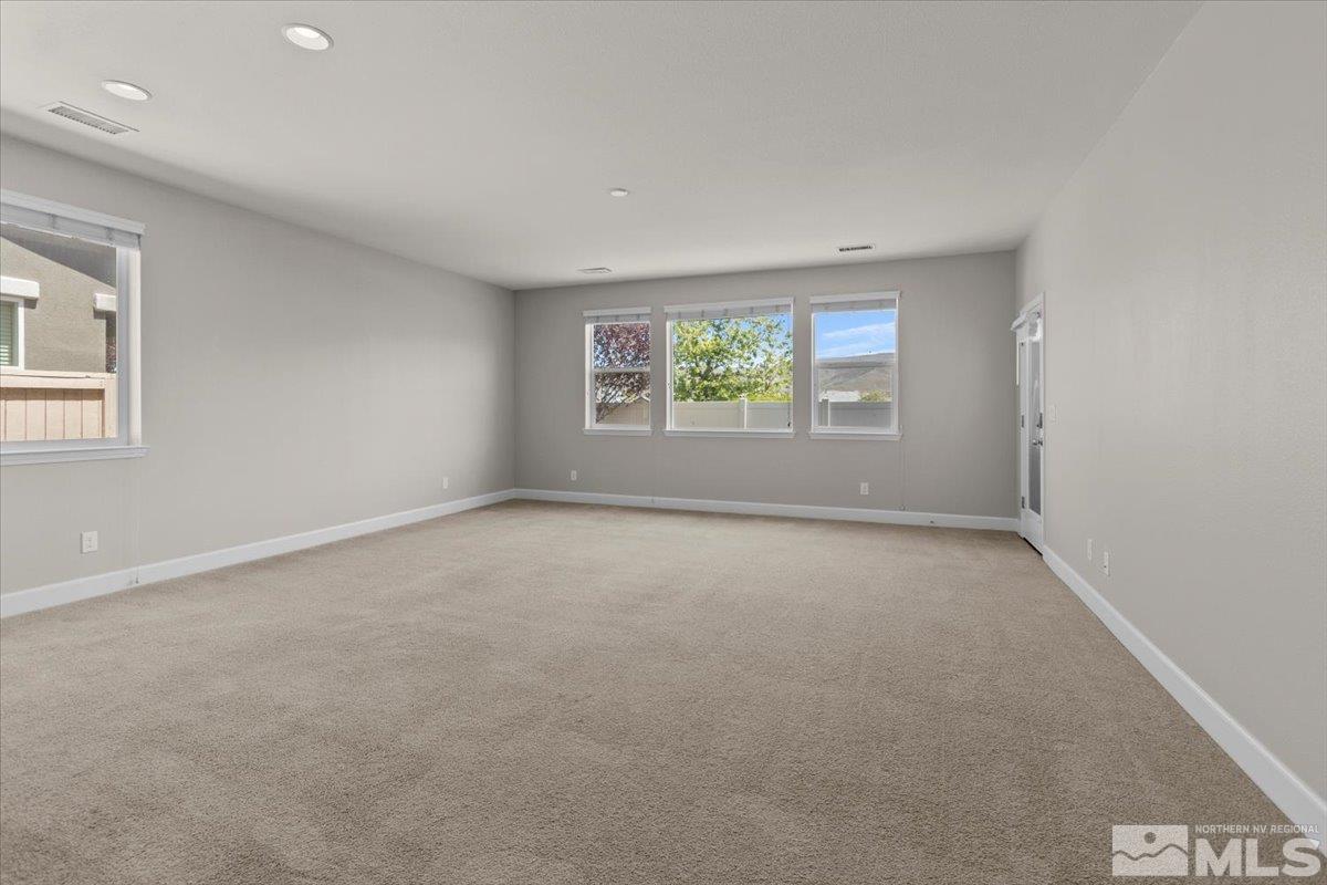 10098 Ignacio Circle Reno, NV 89521 - Photo 16 of 40 an empty room with windows