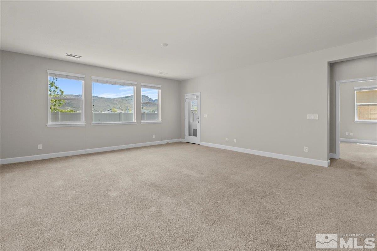 10098 Ignacio Circle Reno, NV 89521 - Photo 17 of 40 an empty room with windows