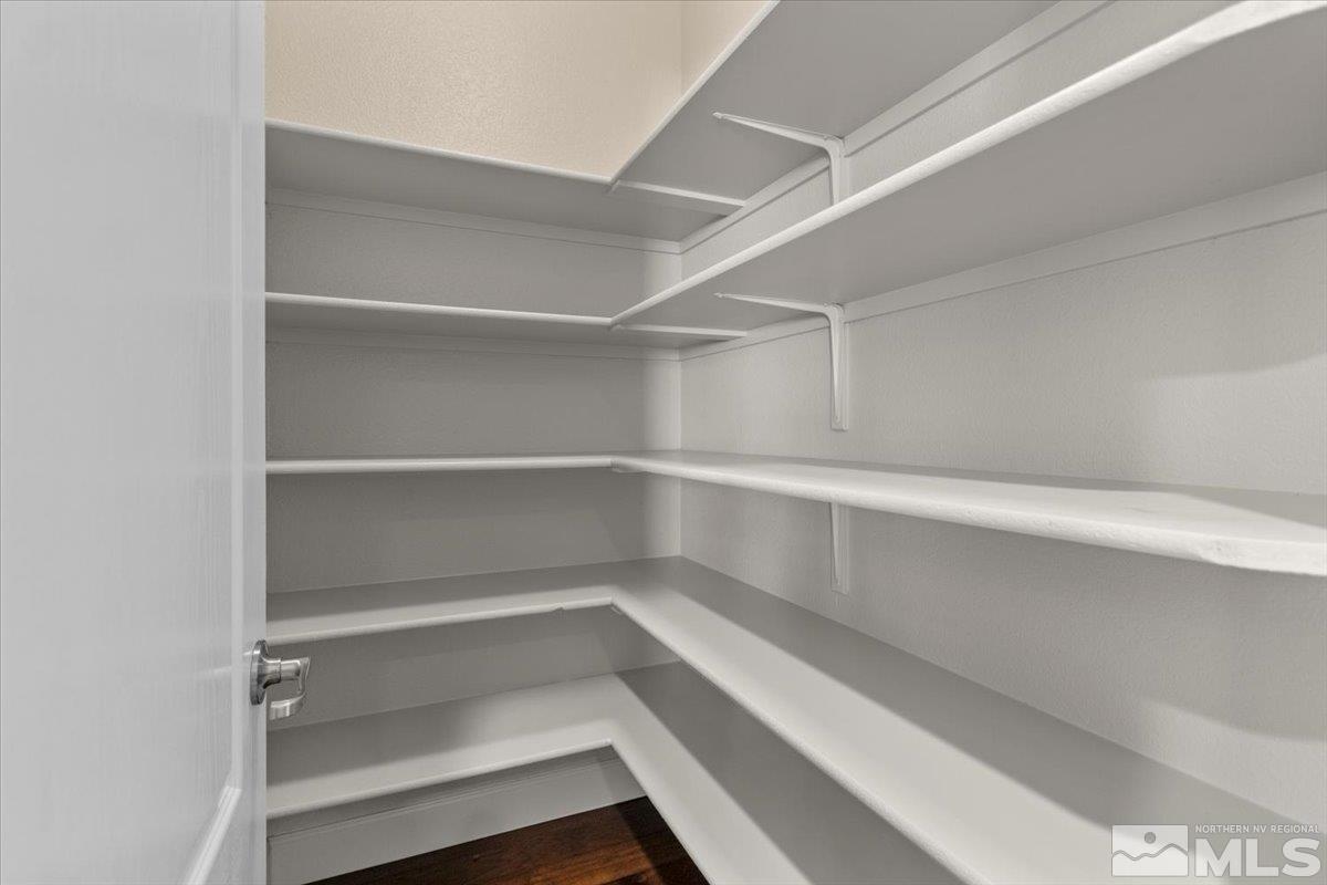 10098 Ignacio Circle Reno, NV 89521 - Photo 18 of 40 a view of walk in closet with empty racks