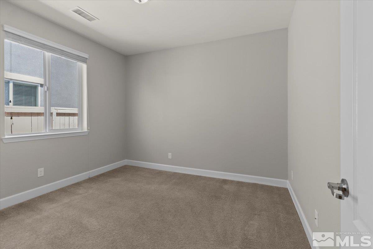 10098 Ignacio Circle Reno, NV 89521 - Photo 25 of 40 a room that has a window in it