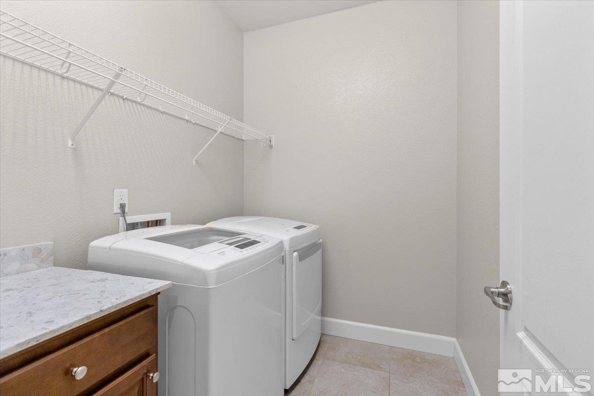 10098 Ignacio Circle Reno, NV 89521 - Photo 29 of 40 a utility room with dryer and washer