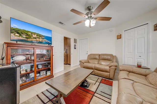 a living room with furniture and a window