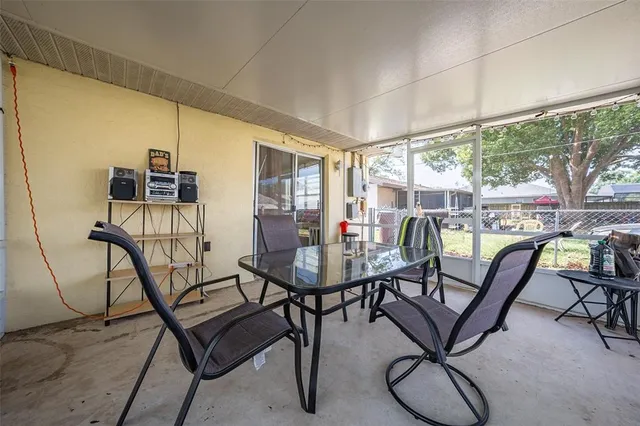 a view of a livingroom with furniture and a table
