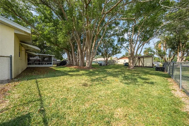 a view of a house with a big yard