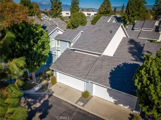 an aerial view of house with yard