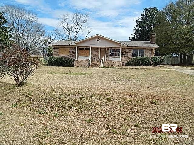 53 Meadowbrook Road Monroeville, AL 36460 - Photo 1 of 27 Ranch-style house with a chimney and a front lawn