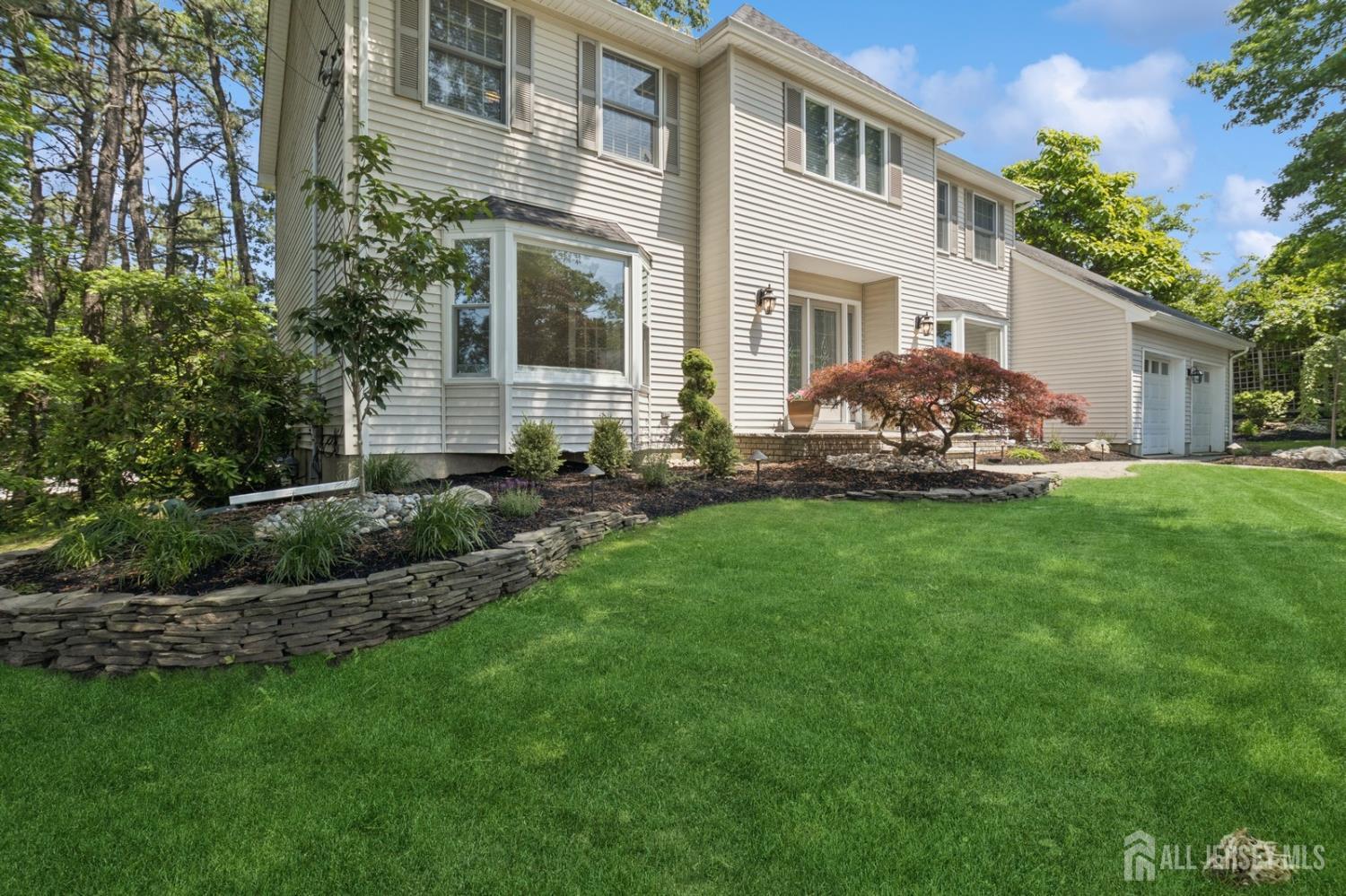 3 Cedar Lane Milltown, NJ 08850 - Photo 2 of 67 a view of house with backyard and garden