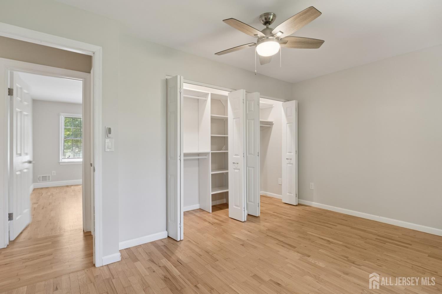 3 Cedar Lane Milltown, NJ 08850 - Photo 40 of 67 wooden floor in an empty room with a window