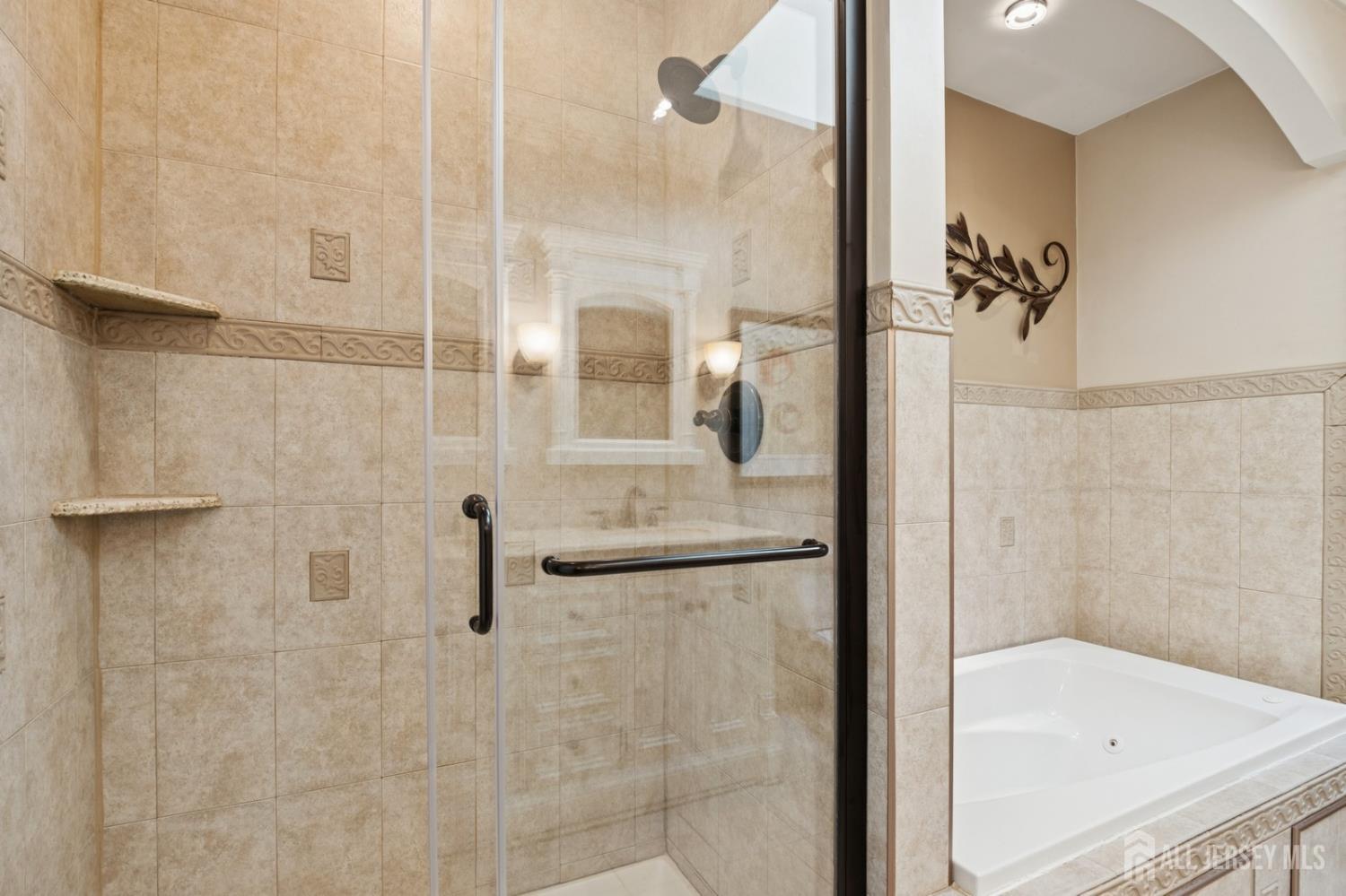 3 Cedar Lane Milltown, NJ 08850 - Photo 43 of 67 a bathroom with a glass shower door