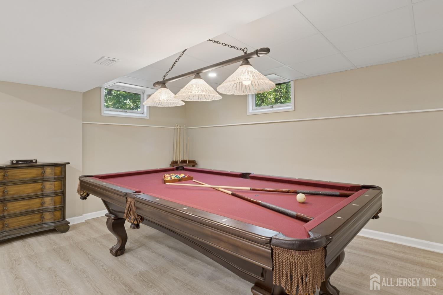 3 Cedar Lane Milltown, NJ 08850 - Photo 45 of 67 a room with pool table and wooden floor
