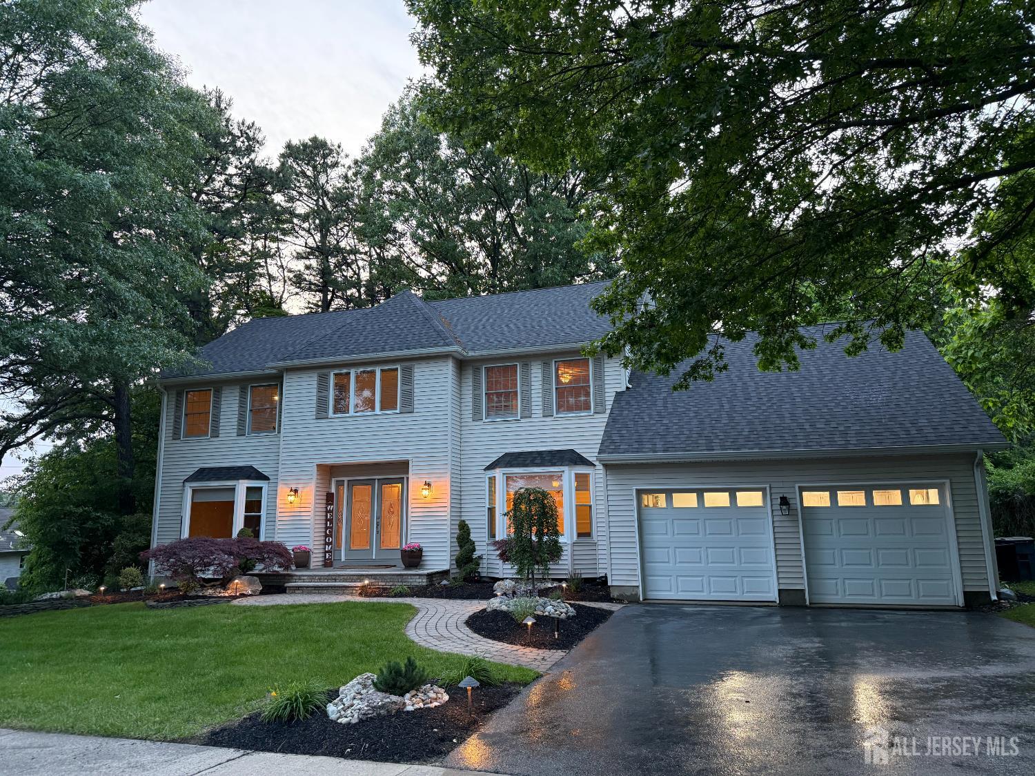 3 Cedar Lane Milltown, NJ 08850 - Photo 58 of 67 a front view of a house with a yard