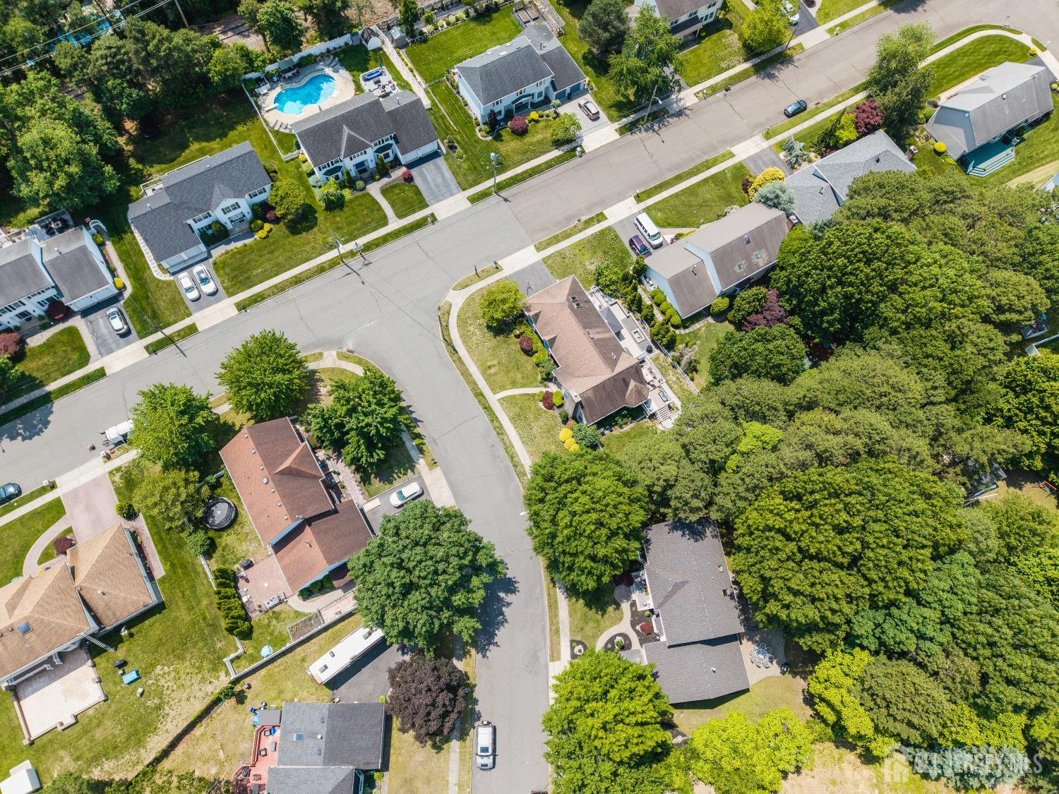 3 Cedar Lane Milltown, NJ 08850 - Photo 60 of 67 an aerial view of residential house with outdoor space and swimming pool