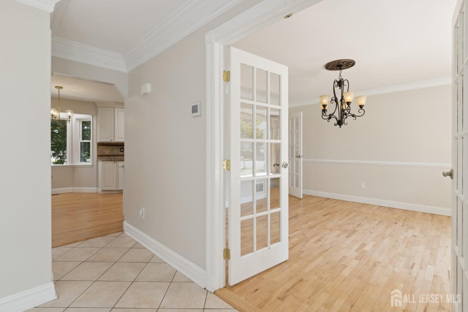 3 Cedar Lane Milltown, NJ 08850 - Photo 9 of 67 wooden floor in an empty room and a window