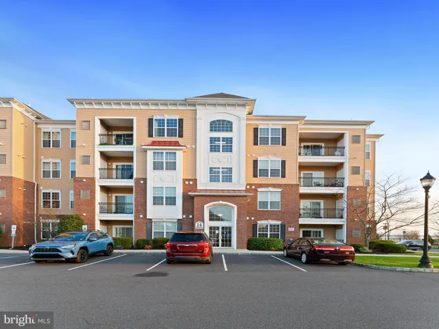 a cars parked in front of a brick building