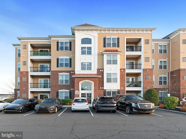 a front view of a building with street view