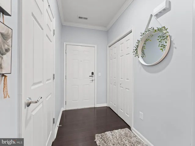 a bathroom with a sink a mirror and a toilet