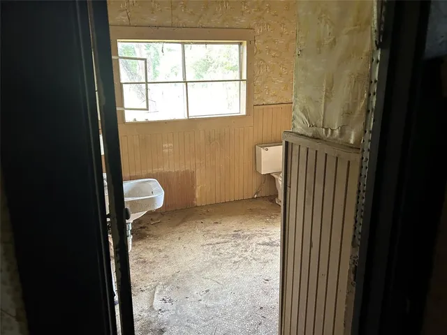 a bathroom with a sink and a toilet