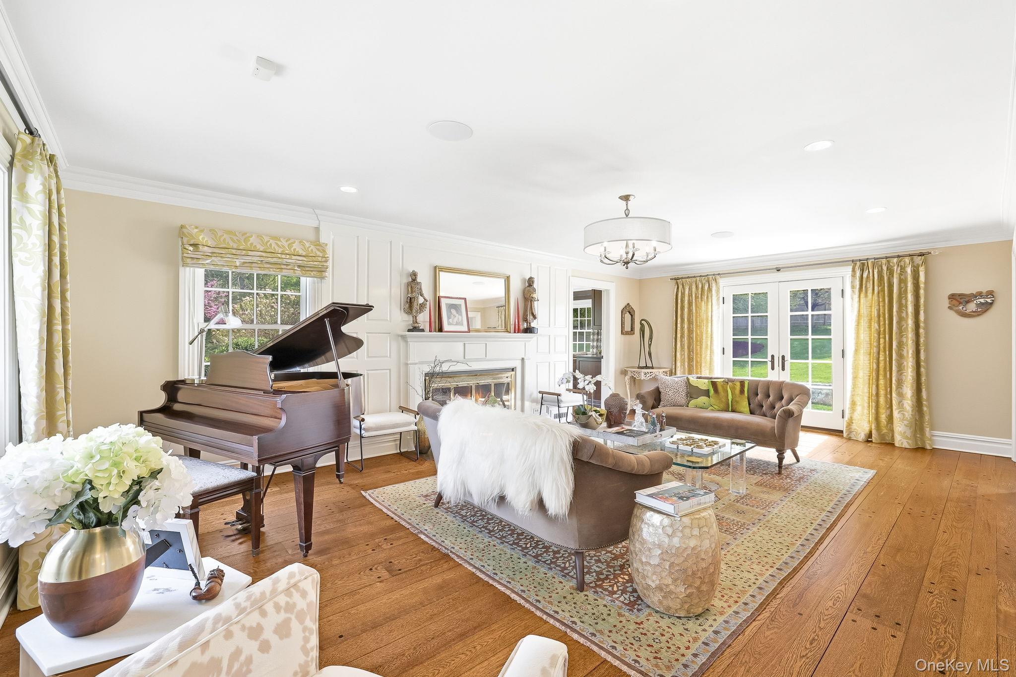 14 Annandale Road Chappaqua, NY 10514 - Photo 16 of 40 a living room with fireplace furniture and a large window
