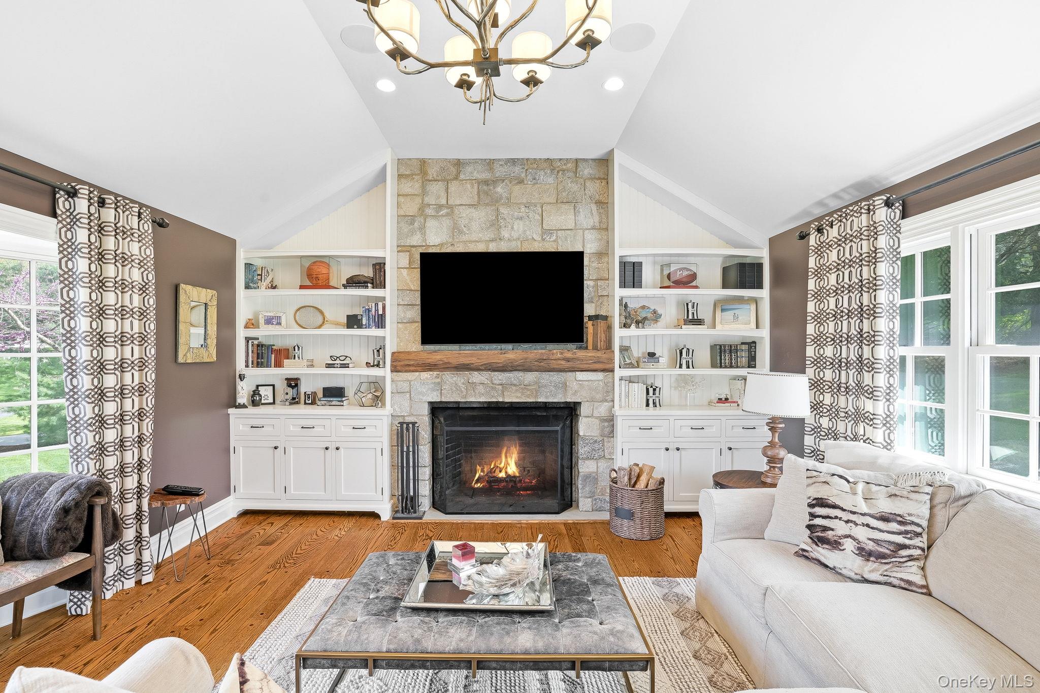 14 Annandale Road Chappaqua, NY 10514 - Photo 19 of 40 a living room with furniture and a fireplace