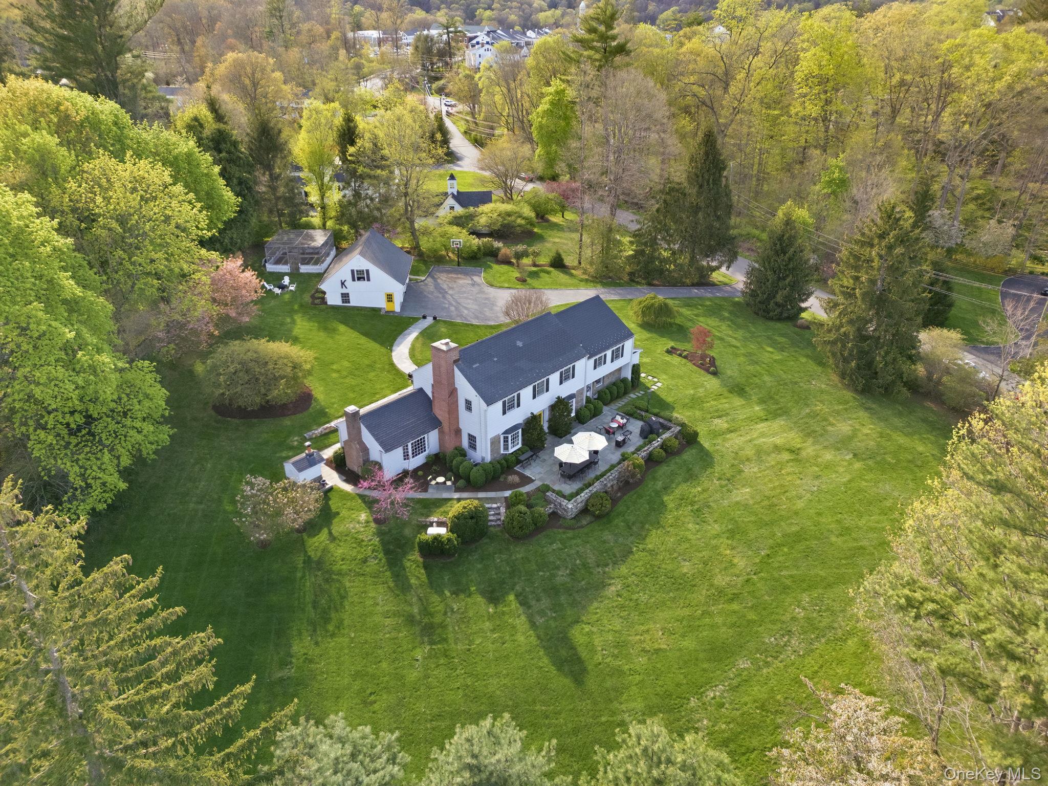 14 Annandale Road Chappaqua, NY 10514 - Photo 3 of 40 a view of a lake with houses