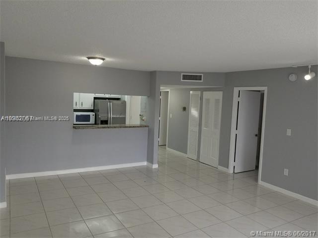 4160 Inverrary Drive, Unit 505 Lauderhill, FL 33319 - Photo 4 of 16 a view of a kitchen with a sink