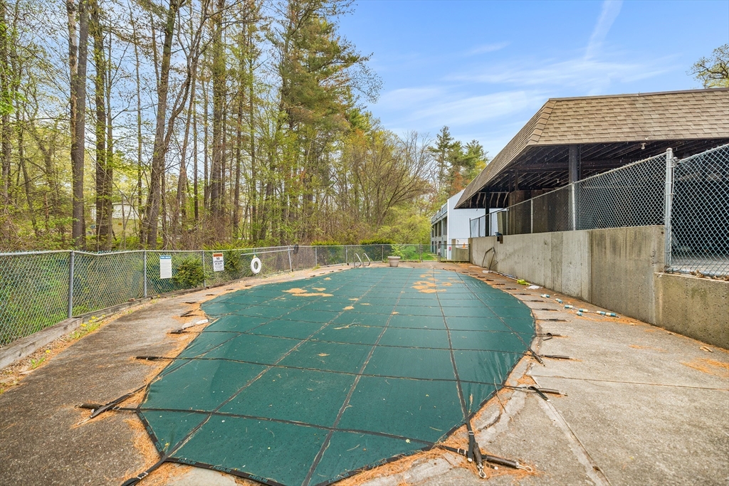 370 Great Road, Unit 8 Acton, MA 01720 - Photo 24 of 27 a view of a backyard