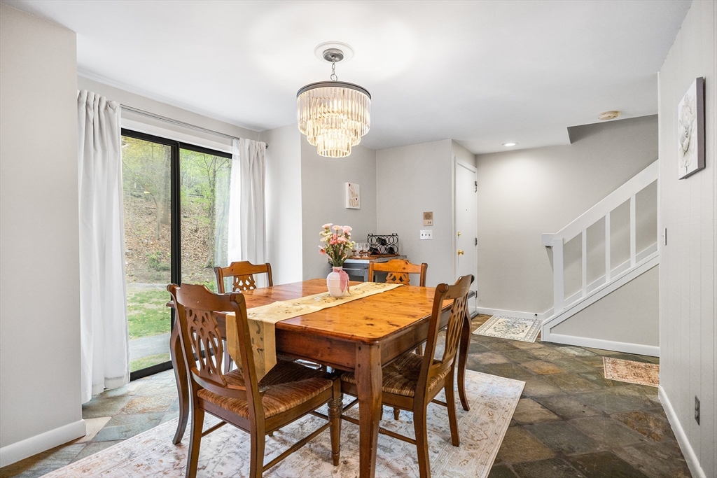 370 Great Road, Unit 8 Acton, MA 01720 - Photo 7 of 27 a view of a dining room with furniture window and wooden floor