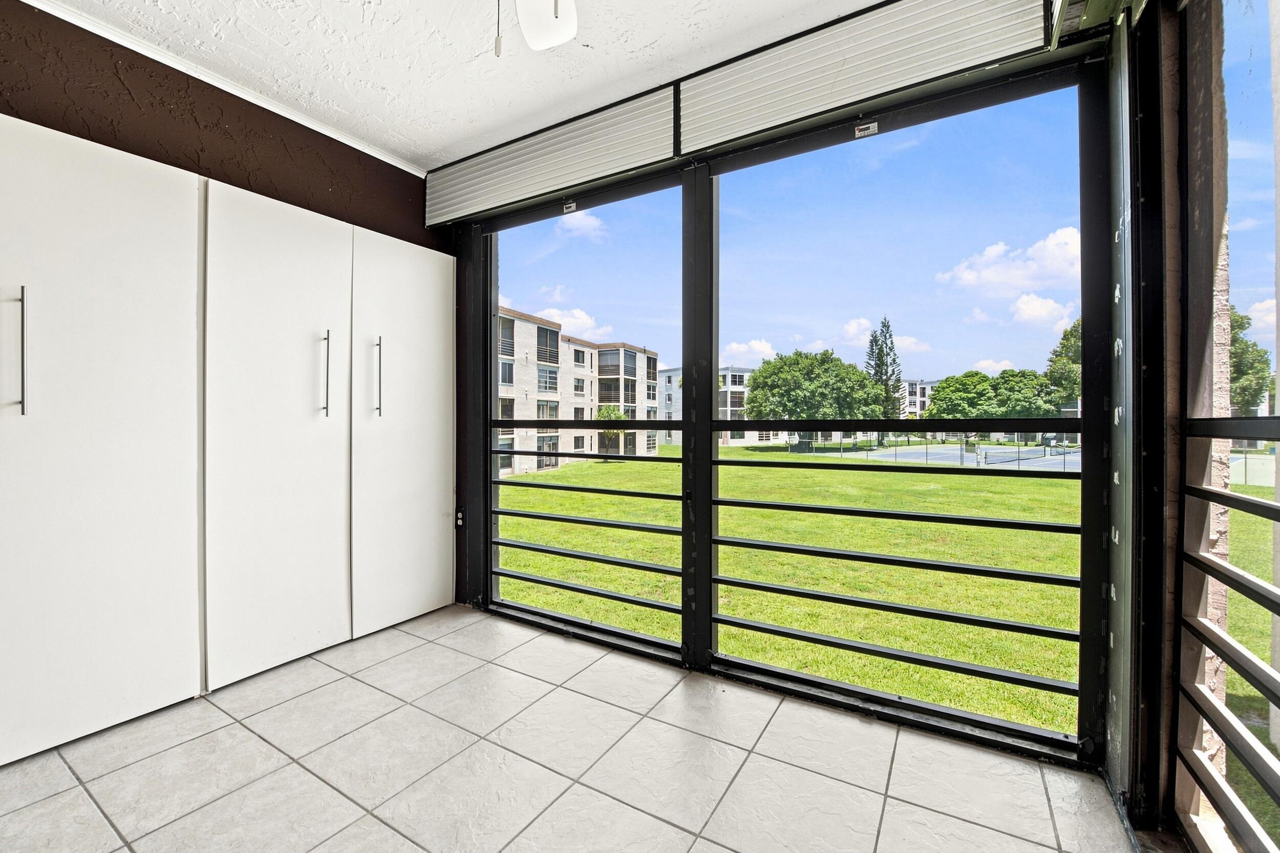 9300 Southwest 8th Street, Unit 219 Boca Raton, FL 33428 - Photo 20 of 26 Screened-in Balcony